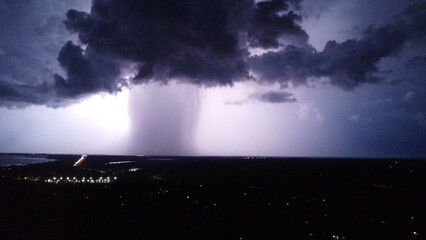 storm over the city at night 
