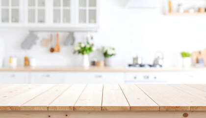 Bright, airy kitchen scene: light wood table top with blurred white cabinetry and fresh flowers background.