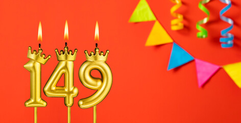 Number 149 candle - Birthday celebration on an orange background with pennants