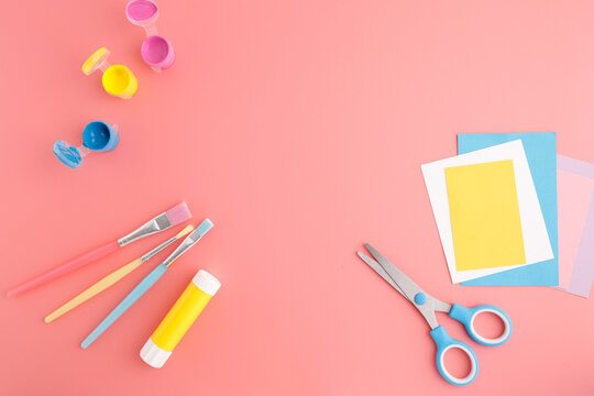 Stationery and craft supplies on pink surface for creative school activities, e-commerce product photography, educational resources, DIY marketing content and art workshop promotion,
