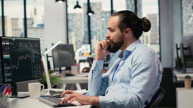 Happy portfolio manager in office celebrates positive stock market investment returns. Cheerful trader pleased by performance metrics, excited after identifying investment opportunity, camera B