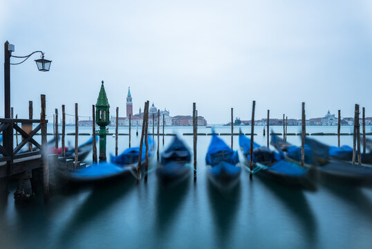 Waves moving gondolas, Venice