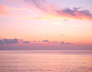Soft, pastel sunset over a tranquil ocean