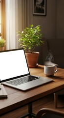 Fototapeta premium Laptop with blank screen and coffee cup on wooden desk near plant in a cozy home office setting