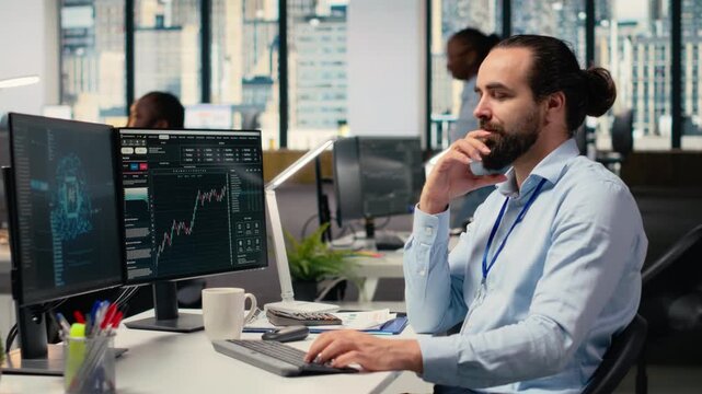 Portfolio manager in office using artificial intelligence to evaluate capital allocation based on economic indicators. Prop firm expert using machine learning to do research driving growth, camera B