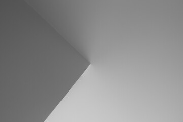 Horizontal abstract photo. Broken diagonal lines. Monochrome, white and gray wall with triangle shape niche. Luxury and elegant template for social media. Mock up. Hotel room. Copy space for text