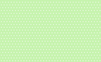 黄緑色の水玉模様の背景素材