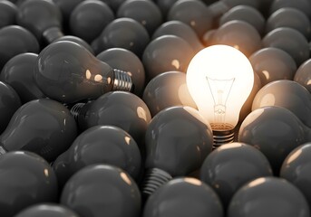 Obraz premium Glowing Light Bulb Surrounded by Dark Bulbs Idea Concept