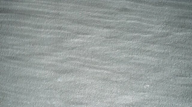 Tokyo,Japan - August 19, 2025: Reflection of water pattern on white wall
