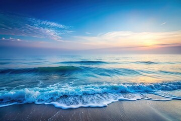 Serene Coastal Sunset Ocean Waves Gently Rolling Onto a Sandy Shore at Dawn