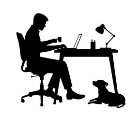 Silhouette of a person working at desk with laptop and dog lying under table