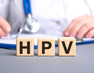 Wooden blocks spelling HPV. Medical professional