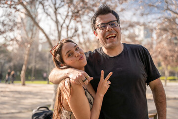 happy young couple a park