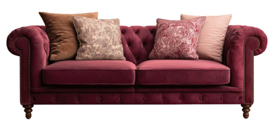 Elegant burgundy velvet sofa with decorative pillows