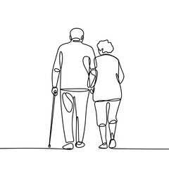 Elderly couple walking together with cane