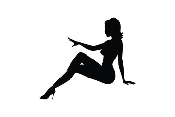 Woman sitting in a suggestive pose silhouette isolated on white background