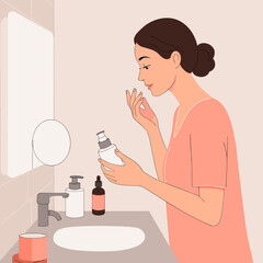 Young woman applying skincare product in modern bathroom  