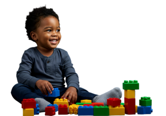 Black toddler boy playing with colorful toy blocks, isolated on transparent background