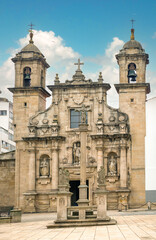 Façade of St. George's Church (Iglesia de San Jorge, Igrexa de san Xurxo) with the typical galician cruceiro in front, la Coruña, Galicia, Spain