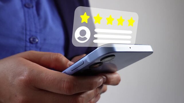 Positive service reviews. Businessperson interacting with his mobile phone with a five-star rating animation.