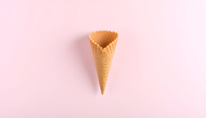 Empty ice cream cones photographed against pastel pink backgrounds, playful minimal concept.