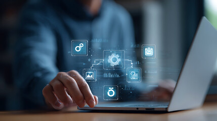 Person using laptop with digital icons and social media symbols floating above