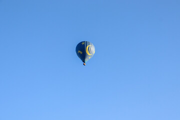 A hot air balloon flying on the sky in Temecula, California USA.