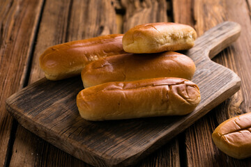 Hot Dog bun on Wooden Background – Classic American Fast Food Snack