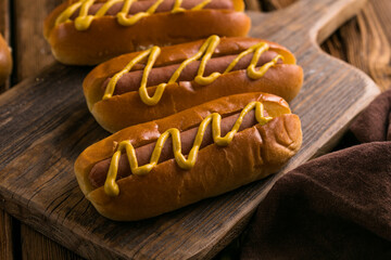Hot Dog on Wooden Background – Classic American Fast Food Snack