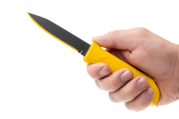 Hand gripping a knife with yellow handle for cutting tasks