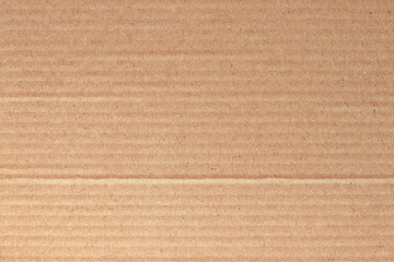 Fototapeta premium Brown cardboard sheet abstract background, texture of recycle paper box in old vintage pattern for design art work.