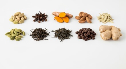 Obraz premium Assortment of spices, herbs, and coffee beans on white background