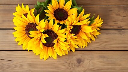 Obraz premium Sunflower arrangement on a rustic wooden surface with warm yellow tones.