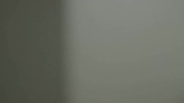 Gradient gray background with softer shadows on one side, minimal and simple