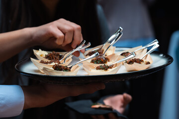 Delicious Sample Dishes Presented on a Tray for Guests to Enjoy