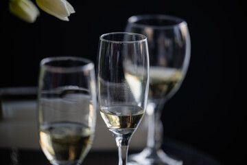 Chic wine glasses positioned on a dark background creating an elegant look
