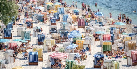 Crowded beach scene with colorful beach chairs and umbrellas