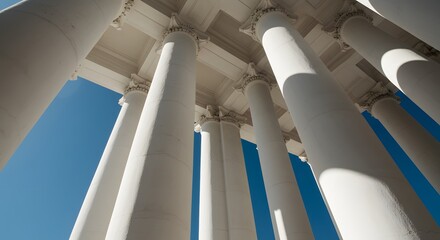 Obraz premium Sleek modern kitchen with black cabinetry, white marble countertops, and stainless steel appliances