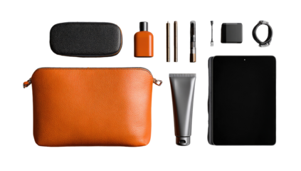 Flatlay of various grooming and travel accessories.  Leather cosmetic bag, toiletries, tech items