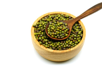 Mung bean (Vigna radiata) seeds in wooden bowl and wooden spoon isolated on white background