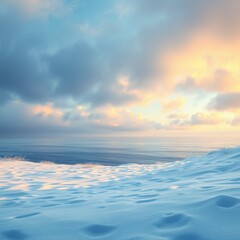 Obraz premium A snowy landscape with a cloudy sky and a body of water in the distance at sunset or sunrise view