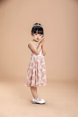 An Asian girl in a flowery dress