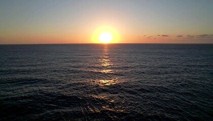 Obraz premium Ocean Sunset with Calm Sea, and Golden Hour. (1)