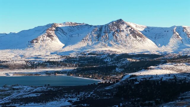 Beautiful Aerial Wide Panoramic View of Caviahue Snow Covered Mountain Range, Argentina