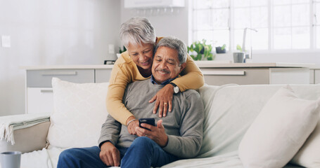 Home, smartphone and senior couple with smile, internet and bonding together with funny meme. Pensioner, apartment or old man with mature woman, cellphone or love with social media or online chatting