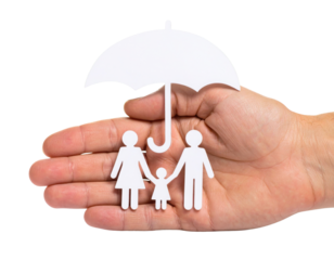 A hand supports cutout figures of a family under an umbrella, symbolizing protection and care.