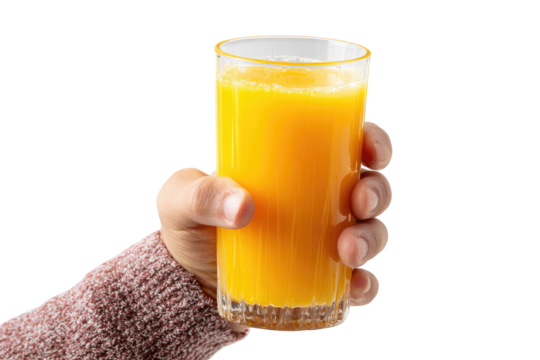 Hand holding a tall glass of orange juice (1)