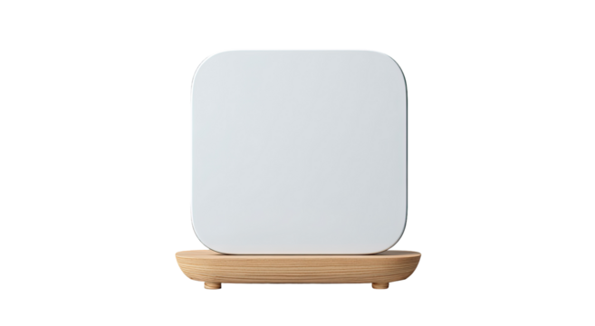Square white device on light-brown wooden base