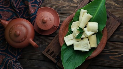 top view of boiled casava or singkong rebus, traditional setting