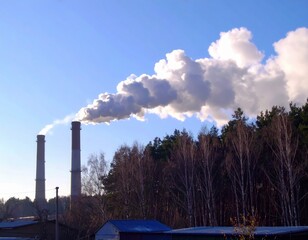 Industrial Factories with Chimney Emissions Air Pollution, environmental problems; global warming concept.